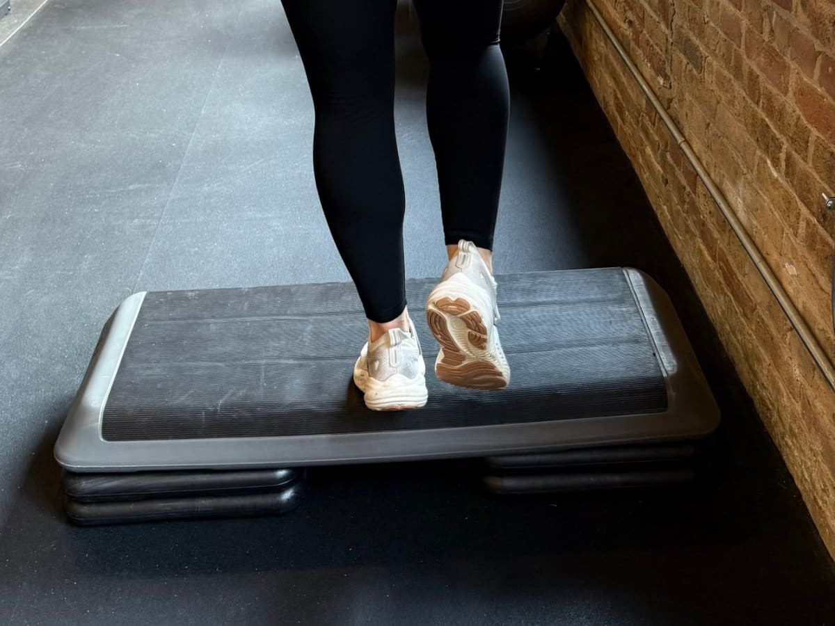 Step up exercise for Achilles tendon repair rehab at Dynamic Physical Therapy Chicago