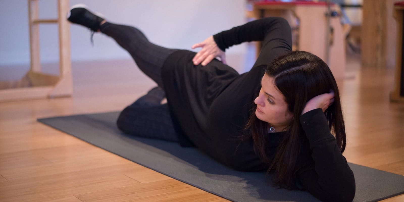 Side lying hip strengthening exercise at Dynamic Physical Therapy Chicago